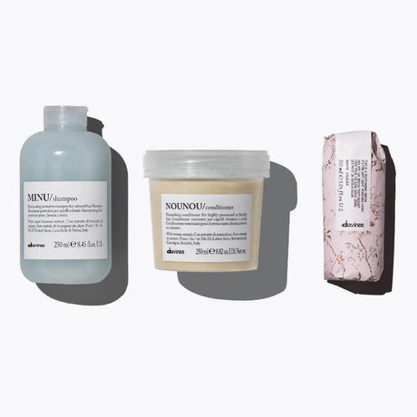 The Nourished Color Set with MINU Shampoo, NOUNOU Conditioner, and Texturizing Serum for vibrant colored hair care.
