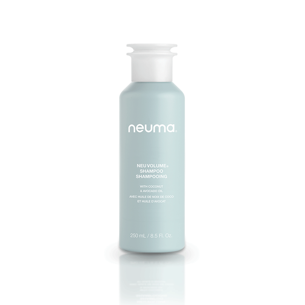 Neu Volume Shampoo bottle with sulfate-free formula for boosting hair volume and shine, featuring coconut oil for gentle cleansing.
