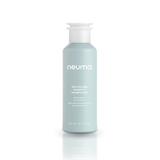 Neu Volume Shampoo bottle with sulfate-free formula for boosting hair volume and shine, featuring coconut oil for gentle cleansing.